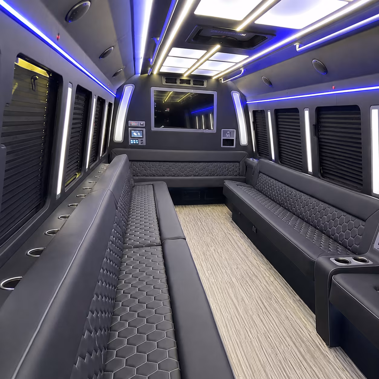 Group beside a Mercedes Sprinter limo in McAllen